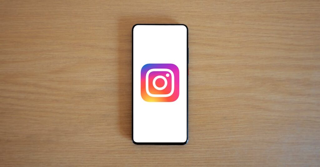 A smartphone with the Instagram logo on display, placed on a wooden surface. Perfect for technology and social media themes.