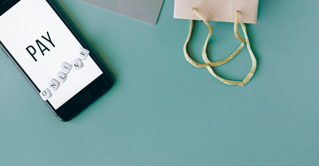 pexels-photo-6214394-6214394 Illustration of online payment with smartphone, credit card, and shopping bag on mint background.